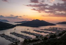 sailboats and yachts moored in setur kas marina at dusk